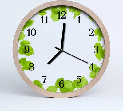 Produktbild von Holzuhr 30fi cm wanduhr - Blätter Natur