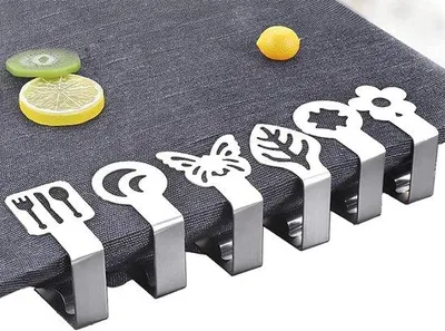 Immagine prodotto di Uniqoos® Set di 12 fermagli per tovaglia, in acciaio inossidabile da 1,5 mm, adatti per tavoli con spessore fino a 2,5 cm, con morsetto robusto, compatti, ideali per interni ed esterni (assortiti)