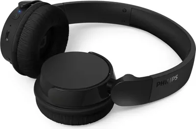A pair of black over-ear headphones is shown on a white background.