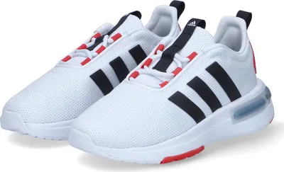 A pair of white Adidas sports shoes with black and red accents, shown from a slightly elevated side angle against a white background.