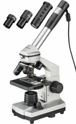 A Bresser junior microscope set with accessories, photographed against a white background.