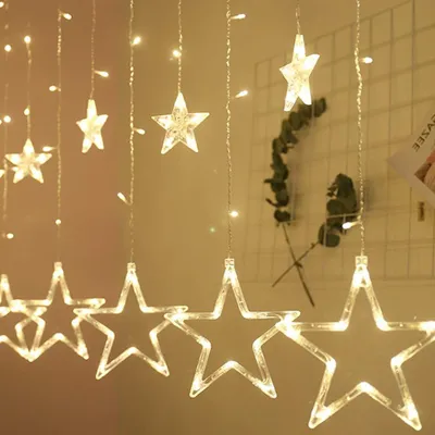 LED-Lichtvorhang 2,5 m, 12 Sterne, 108 warmweiße LEDs, batteriebetrieben