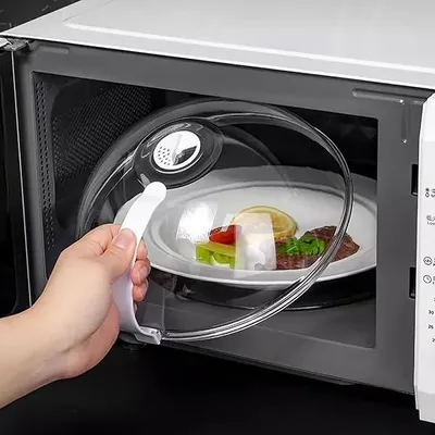 Produktbild von Mikrowellen-Abdeckhaube, BPA-frei Mikrowelleabdeckung mit Griff, Hitzebeständig bis 200°C, Spritzschutz für Mikrowelle, einfach Reinigung