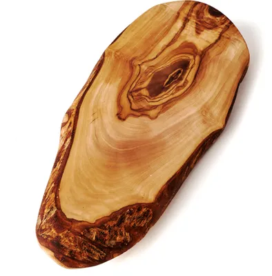A rustic wooden serving board with a live edge and bark detail, presented on a white background.