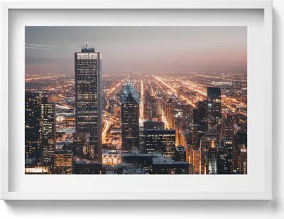 Produktbild von Abendliche Stadt– Wandbild mit Rahmen – Gerahmtes Bild  – Wanddekoration – 70x50 cm –  Weiß Rahmen