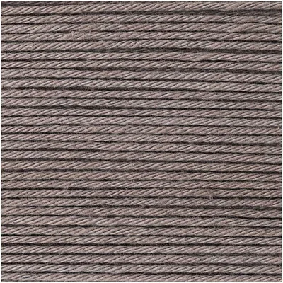 A close-up, textured view of multiple parallel threads or cords.