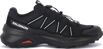 A black Salomon trail running shoe is shown from the side against a white background.