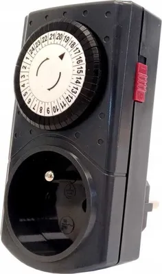 A black mechanical 24-hour timer with a white dial and red switch against a white background.