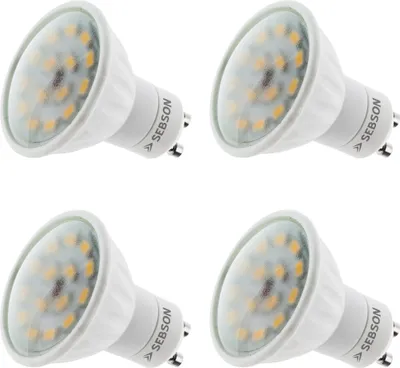 Four LED light bulbs are arranged in a grid on a white background.