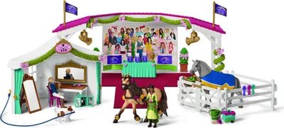 A toy playset depicting a horse show with figures, horses, and accessories.