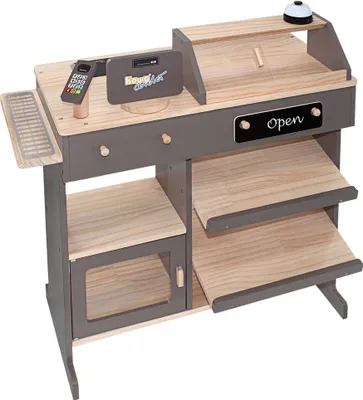 A toy cash register made of wood with various accessories.