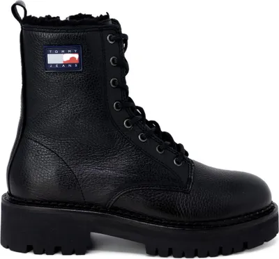 A black Tommy Jeans boot is shown against a white background.