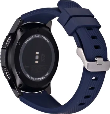 The back of a dark blue smartwatch with a silver buckle and a black strap.