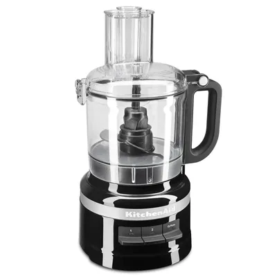 A black KitchenAid food processor is shown against a white background.