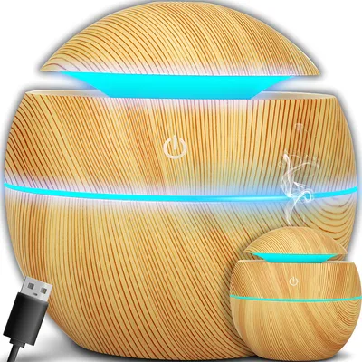 A humidifier with a wood-grain finish and blue LED lighting.