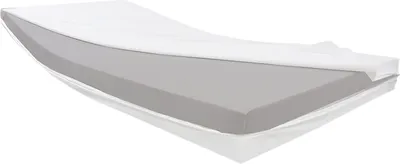 A cross-section of a mattress showing its layers, with a white sheet draped over it.