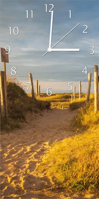 Produktbild von Wallario Design Wanduhr bedruckt, Größe 30 x 60 cm, Motiv: Düne am Strand bei Sonnenuntergang in Frankreich