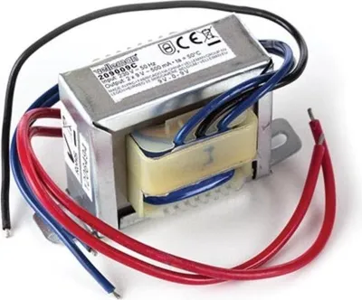 A close-up studio shot of an electrical transformer with wires.