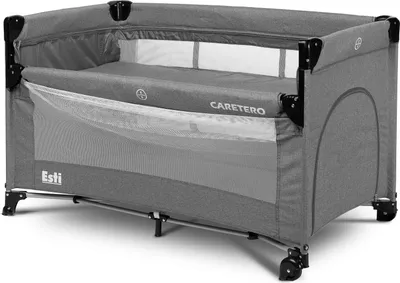 A gray travel crib with a mattress inside, shown from a slightly elevated side angle.