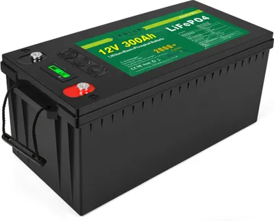 A black lithium-ion battery with a green label on top.