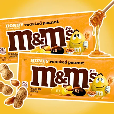 Produktbild von 2x M&M's Honey Roasted Peanut Schokolinsen mit Honig gerösteten Erdnüssen 2 x 49 g + Heartforcards Versandschutz