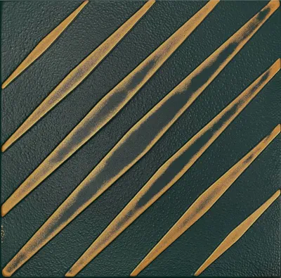A close-up, abstract view of a textured surface with diagonal raised lines.