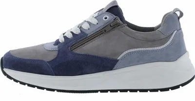 A side view of a single sneaker against a white background.