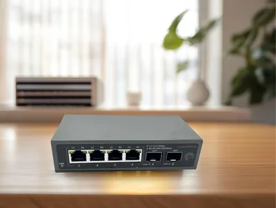 Produktbild von Elfcam - Unmanaged Glasfaser-Switch 10Gb 2x SFP 10G 4x RJ45 2,5G, Plug & Play, Kompatibel mit Freebox Ultra und Livebox 6