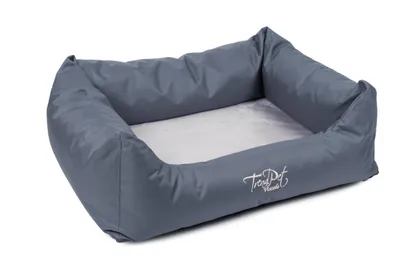 A gray orthopaedic dog bed with a light gray inner cushion, shown from a diagonal angle on a white background.