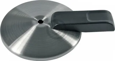 A close-up studio shot of a black handle attached to a circular brushed metal lid.
