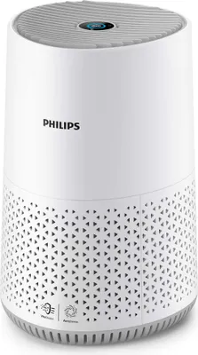 A white Philips air purifier with a perforated base sits on a white background.