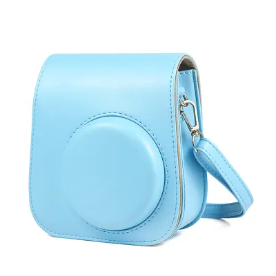 Zdjęcie produktu dla Torba ze skórypoliuretan z paskiem na ramię do aparatu Fujifilm Instax Mini 11, niebieska