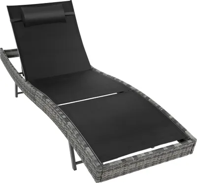 A gray rattan sun lounger with a black cushion and headrest, shown from a diagonal angle on a white background.