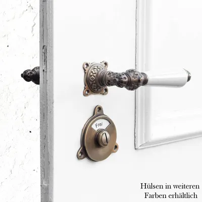 Produktbild von Drückergarnitur für WC Türen, Porzellangriff | Messing patiniert