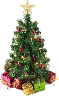 A small, decorated artificial Christmas tree with presents underneath.