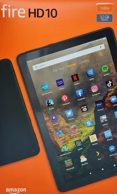 The image shows the packaging of an Amazon Fire HD 10 tablet, with the tablet itself partially visible.