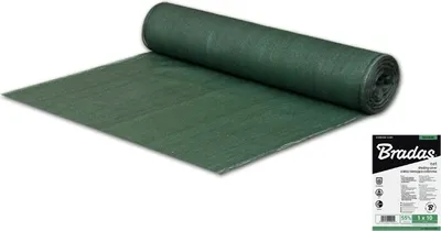 A roll of green fabric is laid out on a white surface, with a packaging label in the bottom right corner.