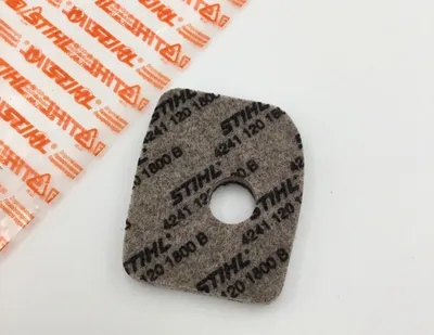 A close-up view of a Stihl air filter and a piece of its packaging.
