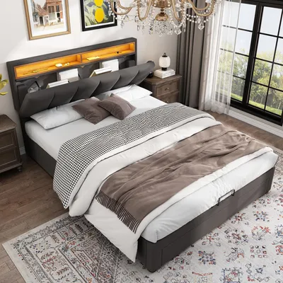 A bedroom scene featuring a bed with storage and LED lighting.