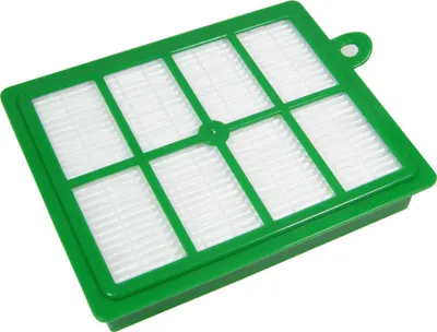 A close-up studio shot of a green and white vacuum cleaner filter.