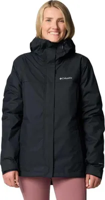 A woman wearing a black Columbia jacket.
