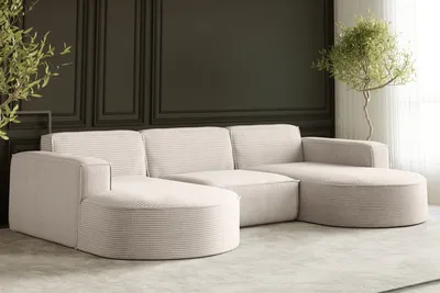A modern living room with a large sectional sofa.