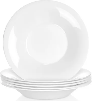 A stack of white bowls on a white background.