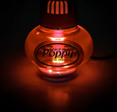Produktbild von Original Poppy Lufterfrischer mit roter LED Beleuchtung 24 Volt, Duft Inhalt 150 ml, Duft Vanille