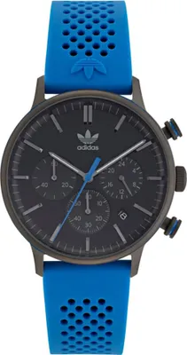 A close-up studio shot of an Adidas chronograph watch with a dark gray face and a bright blue perforated strap.