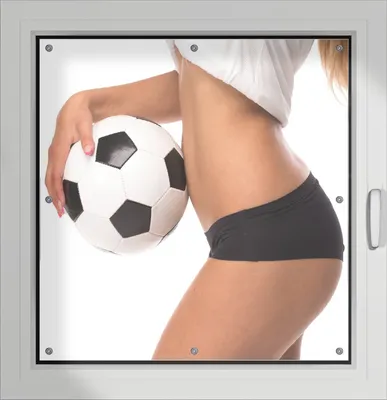 Produktbild von Wallario Lichtschutzbild, Dekorativer Sichtschutz Sonnenschutz 96 x 93 cm mit Motiv: Fußball - sexy Frau mit einem Fußball - Verdunklung ohne Bohren