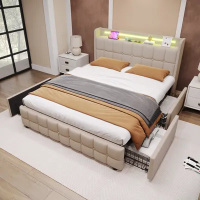 A bedroom scene featuring a beige upholstered bed with LED lighting and storage drawers.