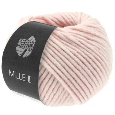 A ball of pink yarn with a black label.