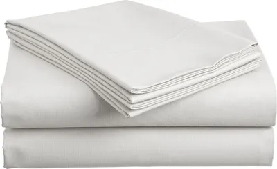 A stack of white bed sheets.