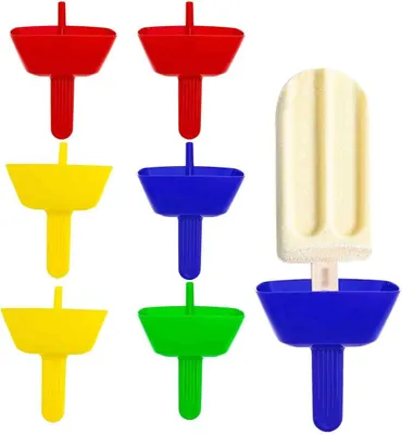 A collection of colorful popsicle holders and one finished popsicle.